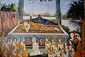 Chiang Mai - Wat Phra That Doi Suthep. The walls of the gallery are covered with Buddha statues and mural paintings of Jataka and tales of the previous lives of the Buddha.